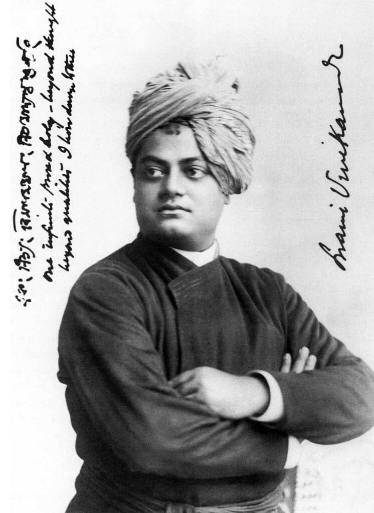 Photo from which the famous poster of 'Vive Kananda, the Hindoo Monk' was made and which was most likely circulated at the World's Fair during the Parliament of Religions (September 11- 27, 1893.) The writing on the left is in Vivekananda's handwriting: 'one infinite pure and holy - beyond thought beyond qualities I bow down to thee'. Photograph taken by portrait photographer Thomas Harrison, Chicago September 1893. (Source: http://www.vivekananda.net/photos/America%201893%201895/America1893-1895.html)